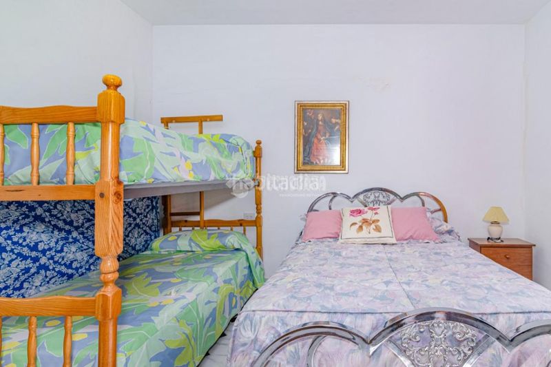 Foto 72799e6a-39fe-459d-ad5c-2f96048609c0. Casa aparellada a Íllora
