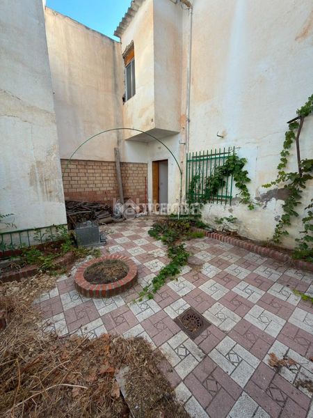 Foto b5dac3c0-22f5-4777-8022-f74d1a07ef5f. Casa aparellada a Cijuela