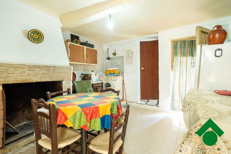 Foto ec55cd29-caa8-41dd-878e-100d299c2fa2. Casa aparellada a Fuente Vaqueros