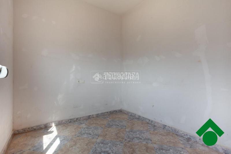 Foto c9ce0f1a-f390-4e86-bea1-17fd6293b376. Casa pareada casa en venta en Chauchina