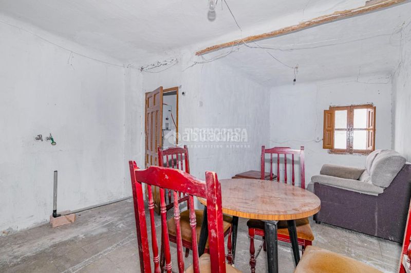 Foto fd610f43-3435-45e9-8a9c-1c2b53ab2d34. Casa aparellada a Güéjar Sierra