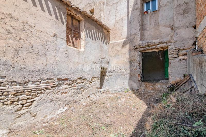 Foto 409891ce-5db1-4c60-a1c7-62f687ae8235. Casa pareada casa en venta en Quéntar