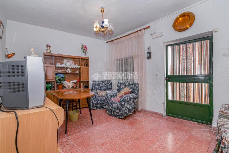 Foto dfcc2590-c2dc-408f-98ce-4373e824b415. Casa pareada casa en venta en Quéntar