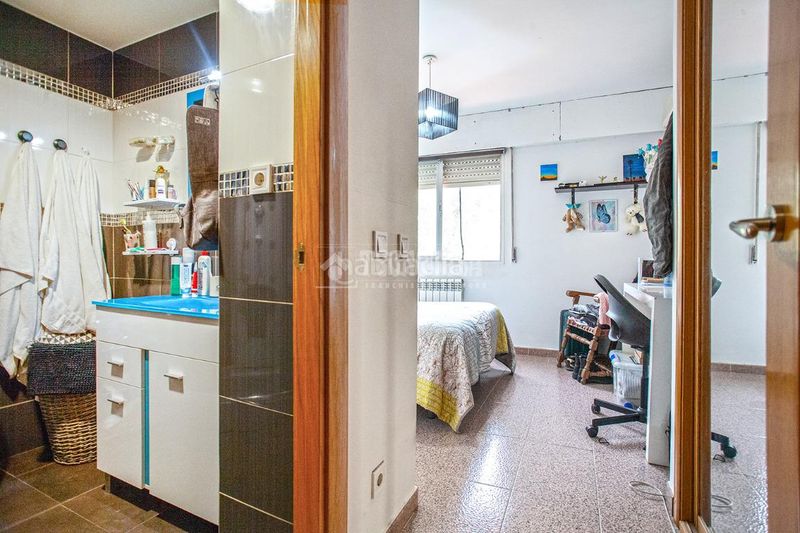 Foto 0e1922b6-0316-43df-ac1b-2be938860a0e. Casa aparellada amb calefacció aparcament piscina a Arganda del Rey