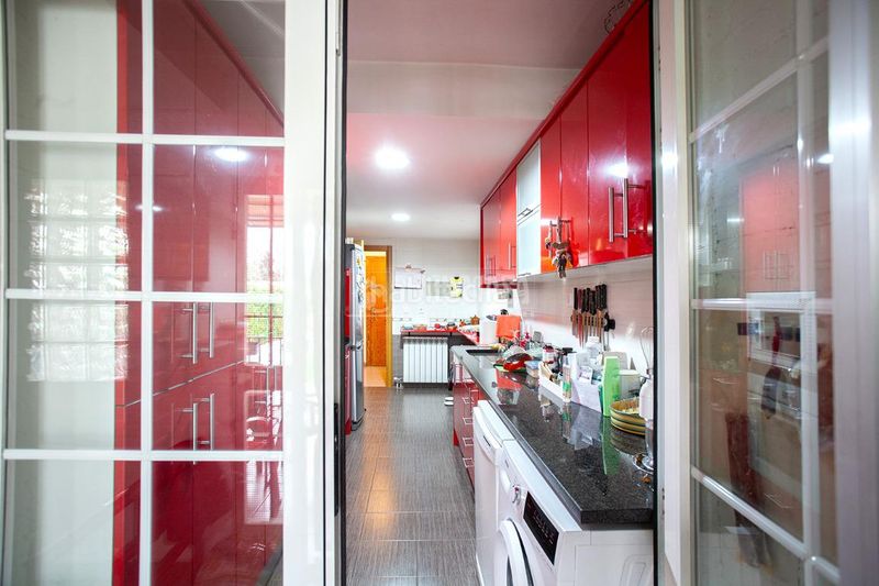 Foto 23b11480-93f7-42f9-a1d3-aa4da5700aeb. Casa aparellada amb calefacció aparcament piscina a Arganda del Rey