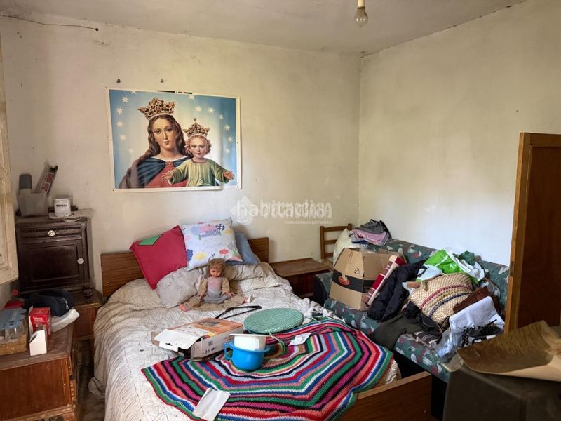 Foto 047d51a7-f723-45e3-a265-b1d5b24a9114. Casa aparellada amb calefacció a La Poveda Arganda del Rey