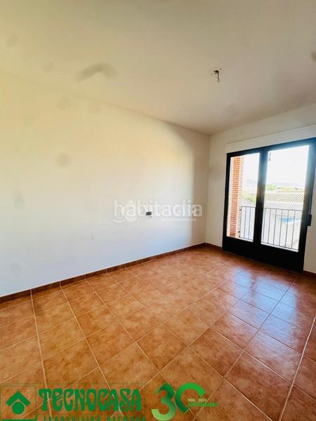 Foto eced5782-43ba-4f53-bf82-460ad1a8c7a6. Casa aparellada a Polán