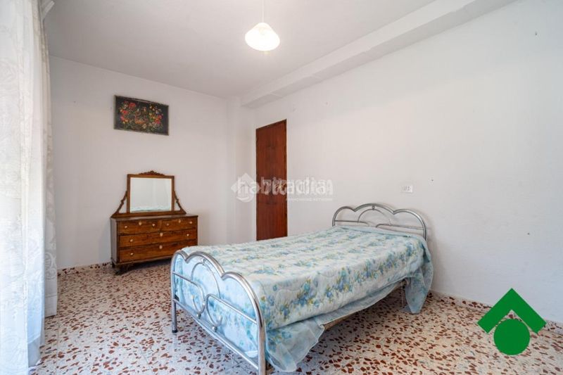Foto 11de4dff-97b2-4636-8e0d-9af392fe5fa5. Casa aparellada amb aparcament a Las Flores - Huerta Gabias (Las)