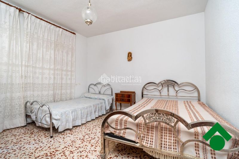 Foto a2246d61-d505-4587-82f9-638b30427adb. Casa aparellada amb aparcament a Las Flores - Huerta Gabias (Las)