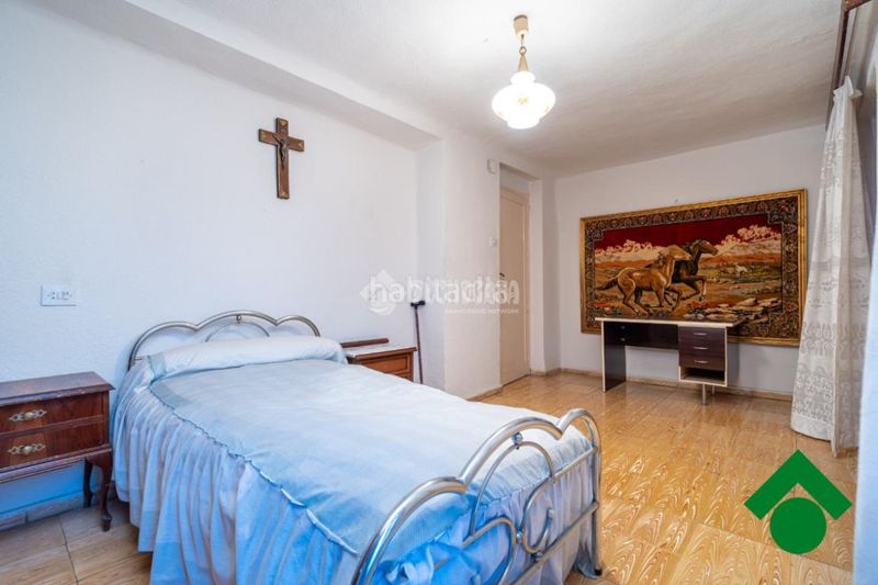 Foto a3fa6bf6-f386-4fc7-b7e4-387f99dac72d. Casa aparellada amb aparcament a Las Flores - Huerta Gabias (Las)