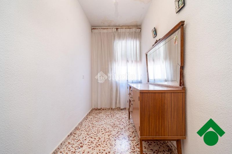 Foto f595677f-d7d9-43e4-80a2-16960269ea53. Casa aparellada amb aparcament a Las Flores - Huerta Gabias (Las)