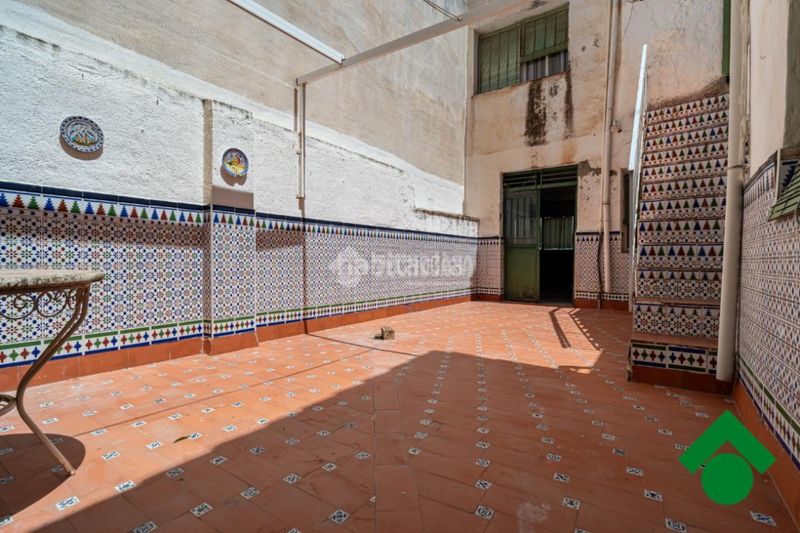 Foto f8856e4e-c216-476b-b3ec-aa8fd2a70e48. Casa aparellada amb aparcament a Las Flores - Huerta Gabias (Las)