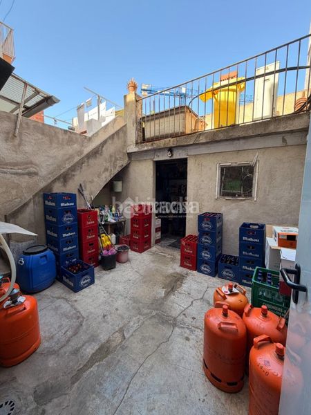 Foto 49cf28db-889f-4321-b30e-c137f9b6f713. Casa aparellada a Eixample Sabadell