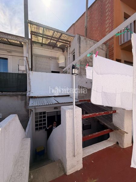 Foto 876ddc30-3263-4b25-a96c-91070421490f. Casa aparellada a Eixample Sabadell