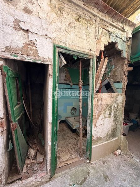Foto c55d9b1f-b7c0-4633-bc2e-209152057e7e. Casa aparellada a Eixample Sabadell
