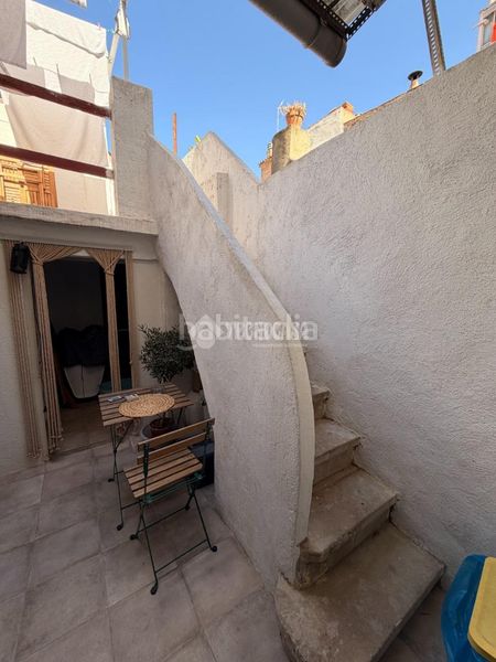 Foto ec3cb2be-a43f-46a8-9034-43cbd5ee0311. Casa aparellada a Eixample Sabadell