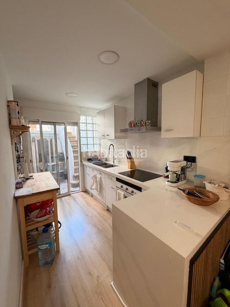 Foto 44b730fe-f9cb-4031-bbef-7a14400e6145. Casa aparellada a Eixample Sabadell