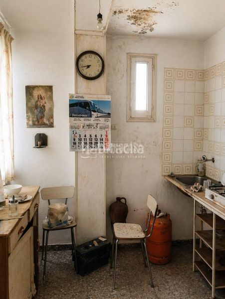 Foto 58675156-cbdd-44c2-8b66-2a7eae9423e5. Casa aparellada a Barrio de Ciudad Jardín Málaga