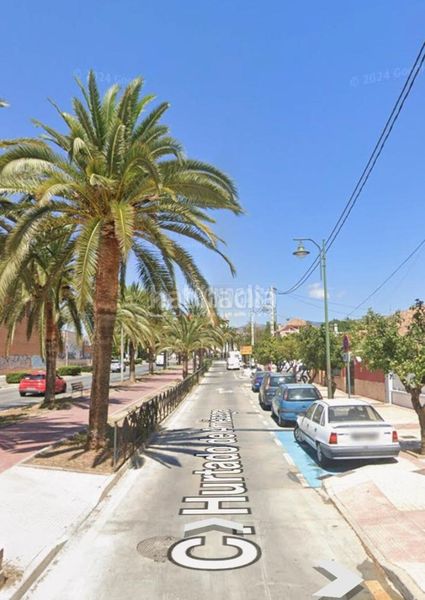 Foto abd1bbff-b861-410d-8d17-ea4a5ac2d4c1. Casa aparellada a Barrio de Ciudad Jardín Málaga