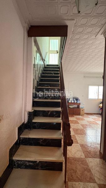 Foto f13cc9bb-69cb-44d2-9895-98d635c71fdf. Casa aparellada a El Molinillo - Capuchinos Málaga
