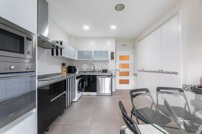 Foto 0d778954-22b5-4d0e-acc8-ca579cfcf5fd. Casa aparellada amb calefacció aparcament piscina a Torrelodones