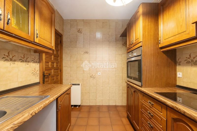 Foto f460e405-47ff-4d14-a272-49112cdf00a5. Casa aparellada amb calefacció aparcament piscina a Torrelodones