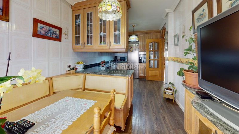 Foto cb7e7391-f094-4c60-87ba-118e7381cb58. Casa aparellada amb calefacció aparcament piscina a Leganés