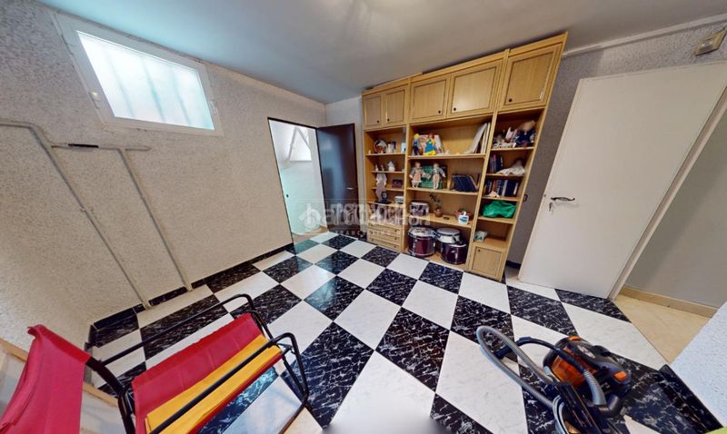 Foto dfdba28f-e6c8-4fe7-a546-dd578976c74e. Casa aparellada amb calefacció aparcament piscina a Leganés
