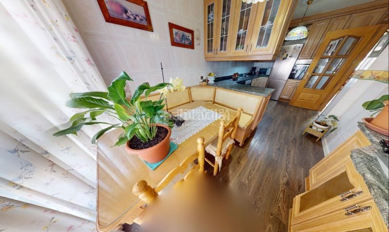 Foto f6d14710-0848-451d-b2e7-6b58e9b3e404. Casa aparellada amb calefacció aparcament piscina a Leganés