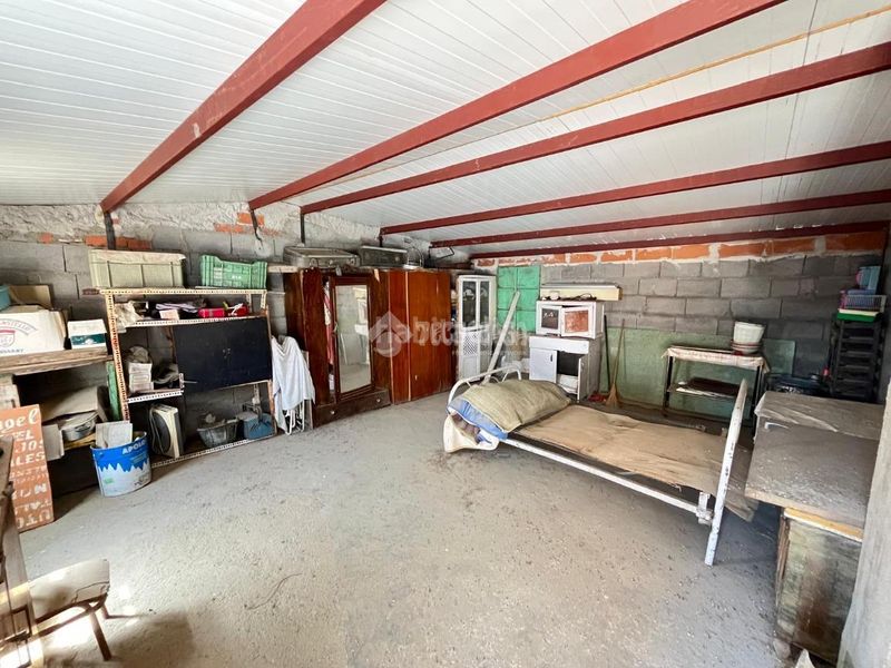Foto e23290b8-f046-4859-9d7d-a17383ef1511. Casa aparellada a Navalcán