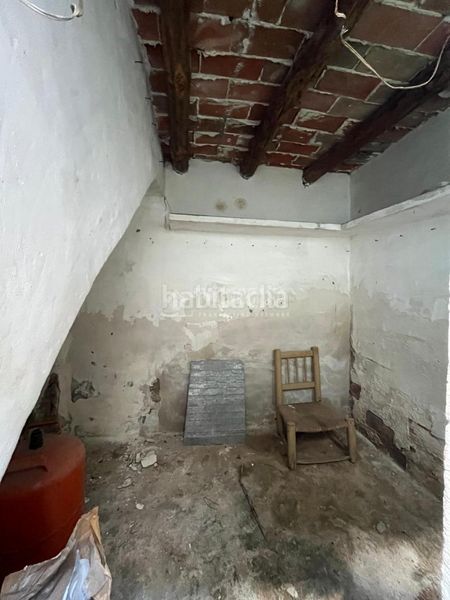 Foto 75083ffc-80b4-4ef3-9c7b-24b93e9f9473. Casa aparellada a Torrico