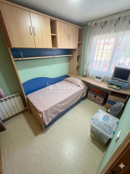 Foto a4a21096-471a-47b4-a79c-e3d165ded69e. Casa aparellada amb aparcament a Hispanoamérica-Comunidades Valdemoro