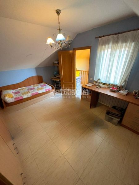 Foto d9f03fca-ed38-4b56-87f1-fb307b4c6feb. Casa aparellada amb aparcament a Hispanoamérica-Comunidades Valdemoro
