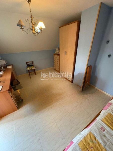 Foto eeec3fb4-e6fc-4d2e-a388-e021847f6add. Casa aparellada amb aparcament a Hispanoamérica-Comunidades Valdemoro