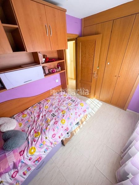 Foto f73a59a0-2cbc-4ee4-b031-0c829d324df1. Casa aparellada amb aparcament a Hispanoamérica-Comunidades Valdemoro