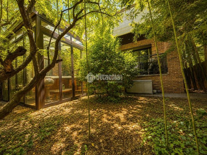 Foto 38604849-b561-450c-bb15-0a0e7b23710b. Casa aparellada amb calefacció aparcament a Villanueva de la Cañada Villanueva de la Cañada
