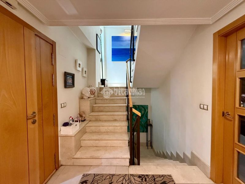 Foto 5647cbcb-f926-4dd8-a148-7fec06368e41. Casa aparellada amb calefacció aparcament a Villanueva de la Cañada Villanueva de la Cañada