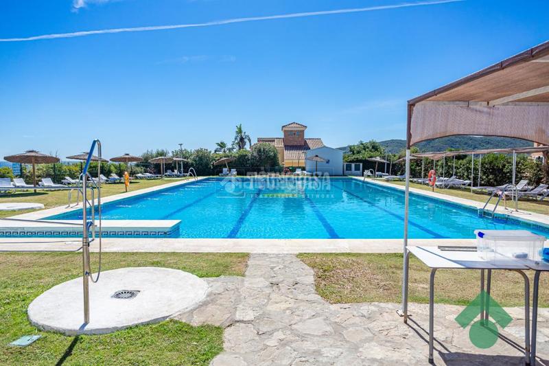 Foto 36b9f528-a01c-4d1a-b67b-993c14c2e85b. Casa aparellada amb piscina a San García Algeciras