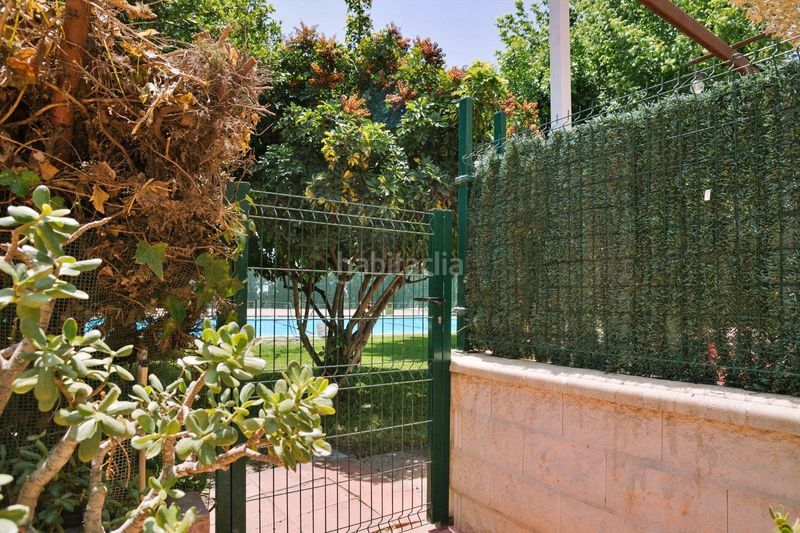 Foto 6cce8765-fcf5-4004-ad83-2fb5e8fde357. Casa adossada amb aparcament piscina a Hispanidad - Vivar Téllez Vélez - Málaga