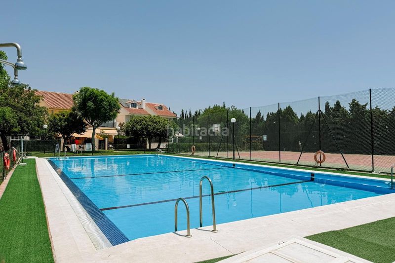 Foto e0a0efa3-c9a2-479b-abb4-7af46292ad37. Casa adossada amb aparcament piscina a Hispanidad - Vivar Téllez Vélez - Málaga