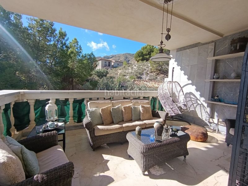 Foto 71ec3809-886e-4f0e-a551-e04b8cf53eb6. Casa chalet independiente con terraza y parcela edificable en entorno tranquilo en Orxeta