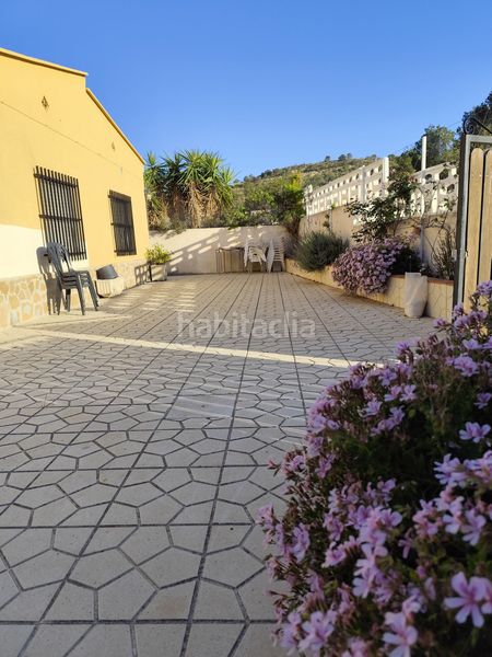 Foto bf54f138-91d3-4de3-b17c-103edf512901. Casa amb piscina a El Secanet-Hacienda del Sol Vila Joiosa (la)