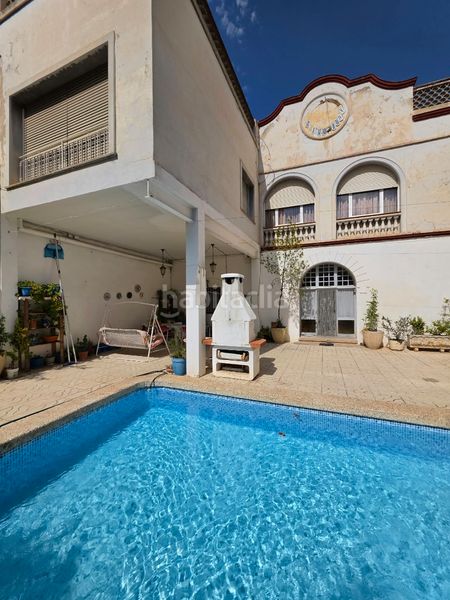 Foto b455aa58-8eb5-4053-88ca-9bddea3d221c. Casa amb xemeneia calefacció aparcament piscina a Igualada