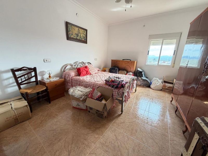 Foto 0fa9c104-0f82-49eb-a48b-d3644beb3f0b. Casa aparellada amb calefacció a Martos