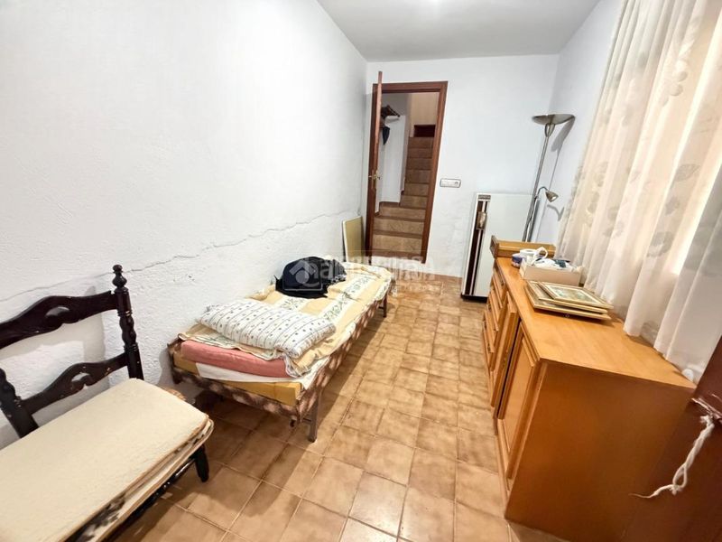 Foto c71358b9-46ec-4b2a-afda-315d7f4f6aaf. Casa aparellada amb calefacció a Martos