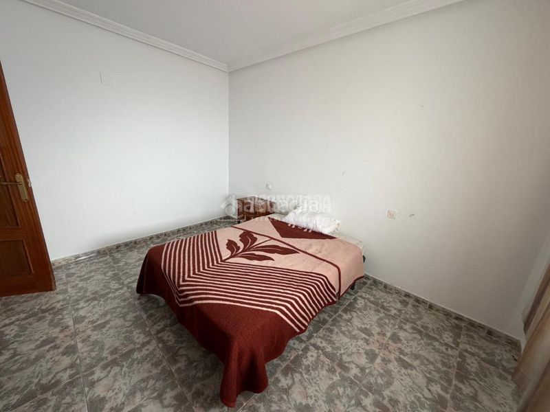 Foto 50af3630-a787-4b7b-914f-89a0007722e2. Casa aparellada a Alcaudete