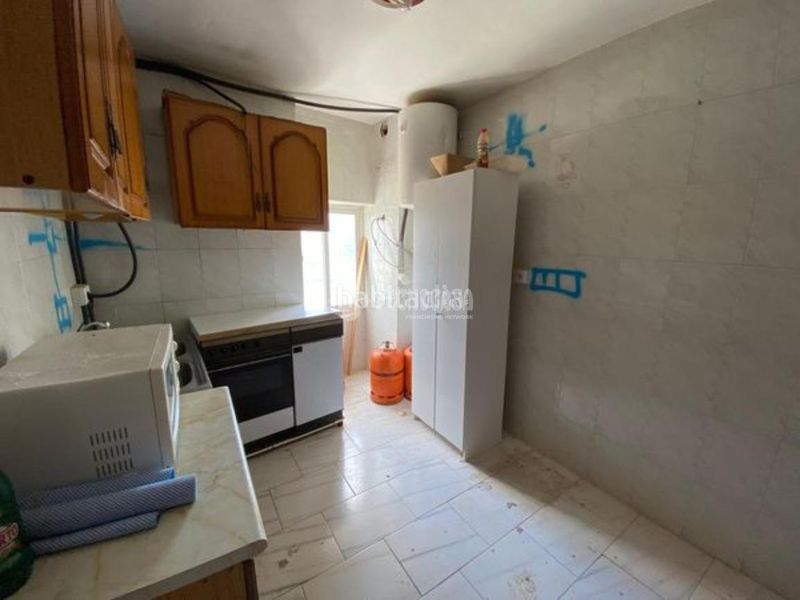 Foto 52adc55b-84a8-43a8-adb0-a60c7e4cf83a. Casa aparellada a Martos