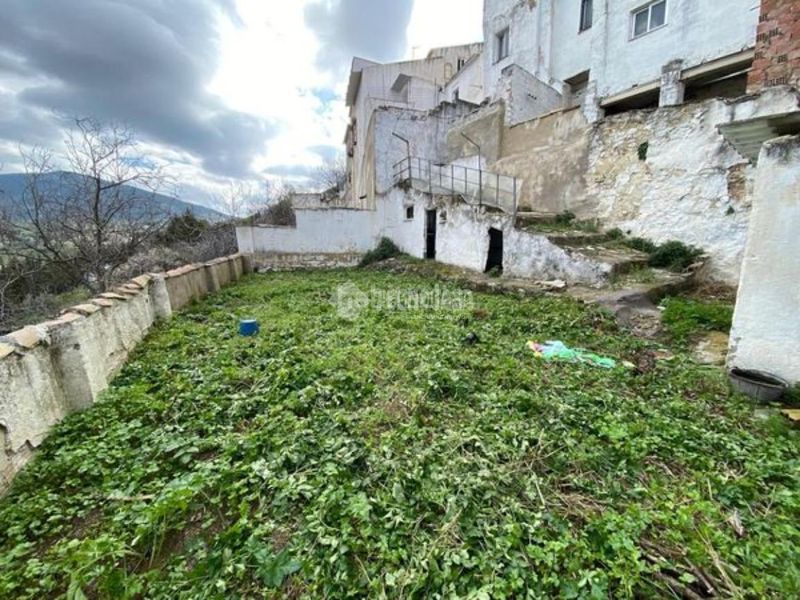 Foto 9f8ccf16-7fe4-4c7b-bc7b-c190f4696213. Casa aparellada a Martos