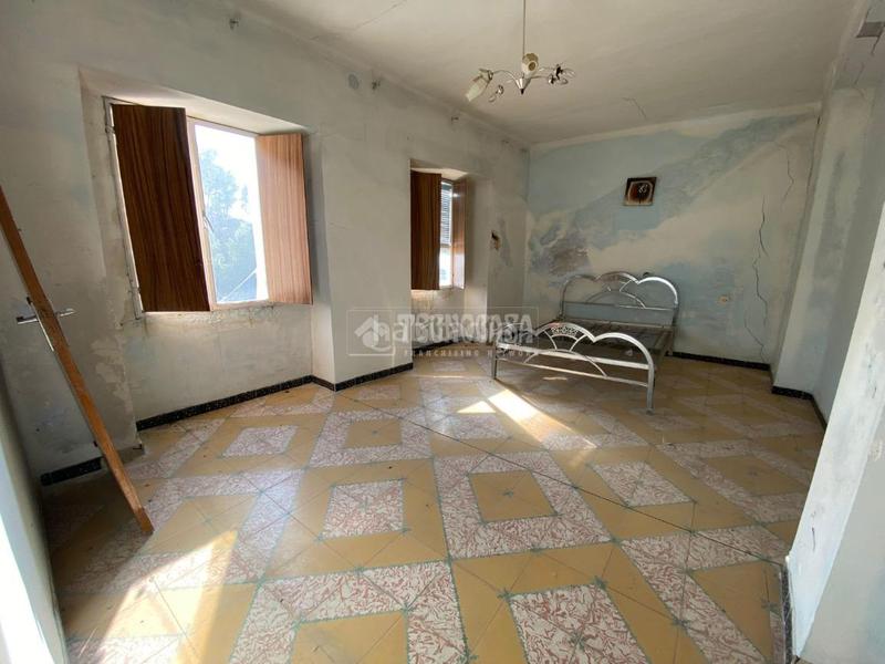 Foto ae668042-b459-44f9-b910-ab7ec4bb5759. Casa aparellada a Torredonjimeno