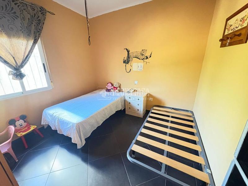 Foto 99ce0186-ac4d-4e93-aa09-eafc7cd03149. Casa aparellada a Martos